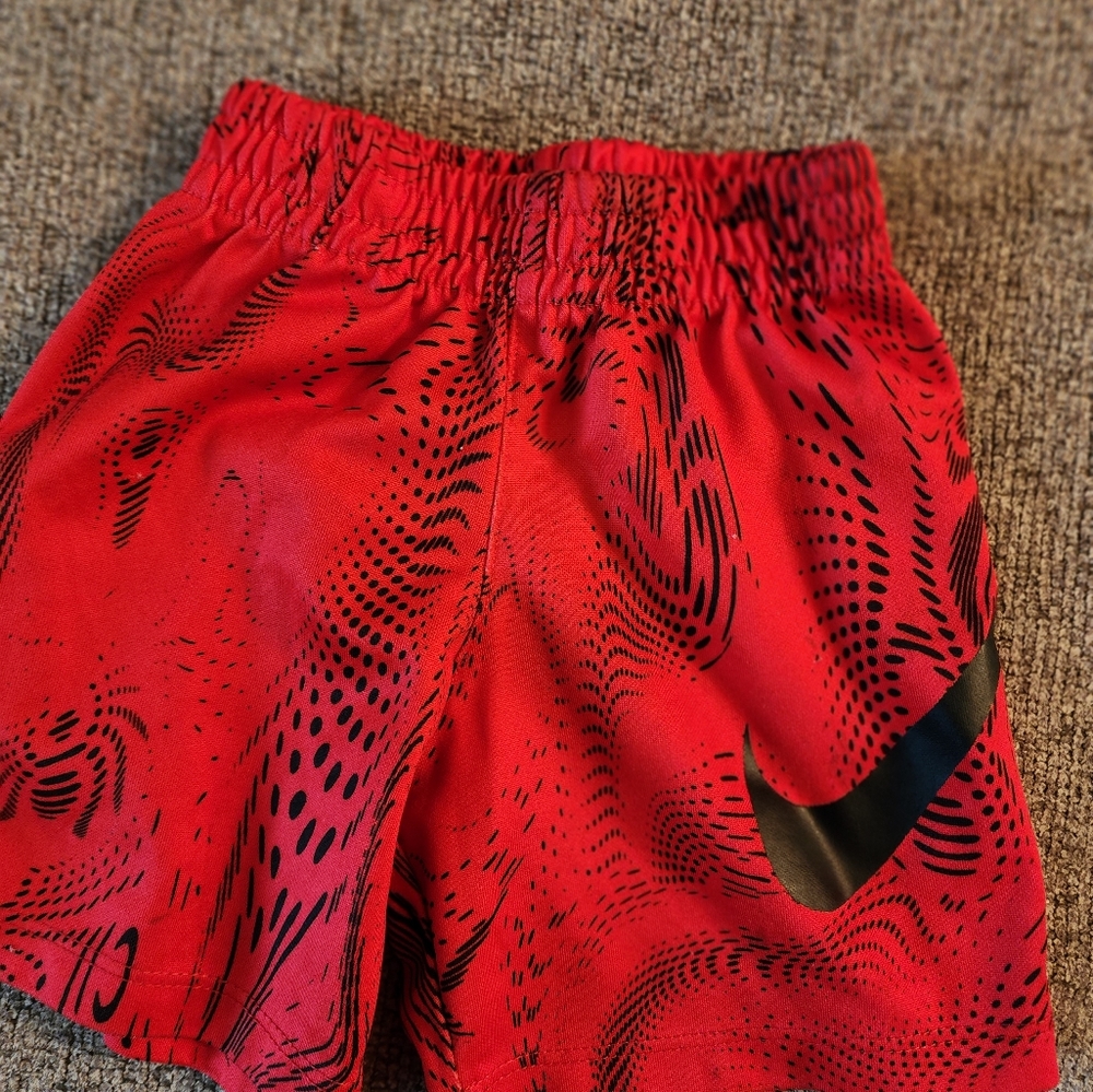 Red Nike shorts